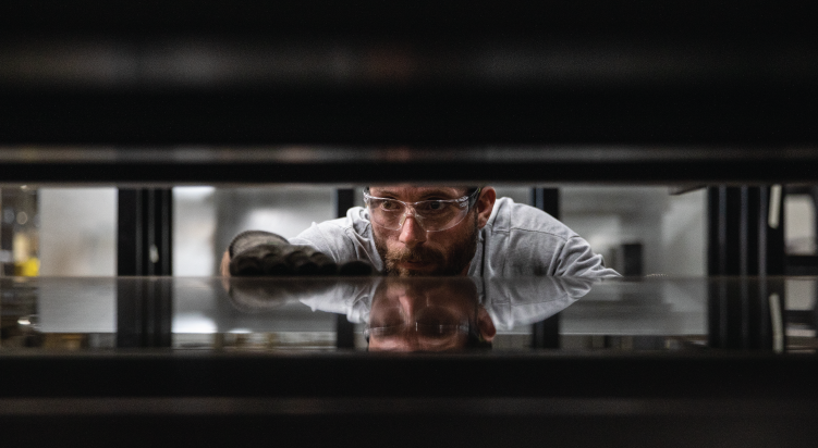 Employee inspecting a machine