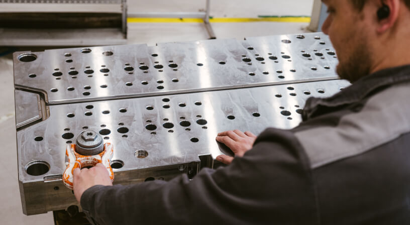 Adjusting large screw on machinery